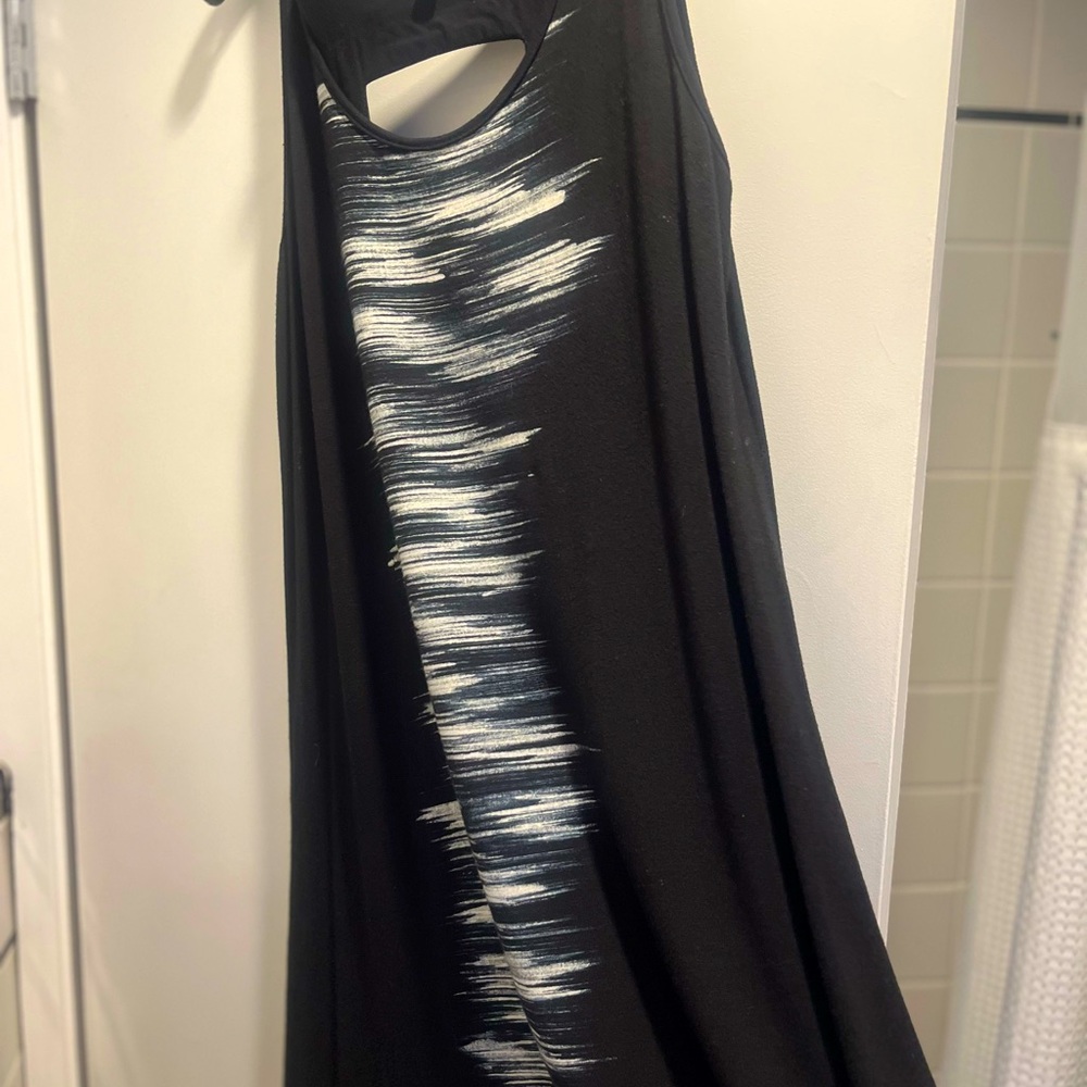 Great sundress w leather trim in back.